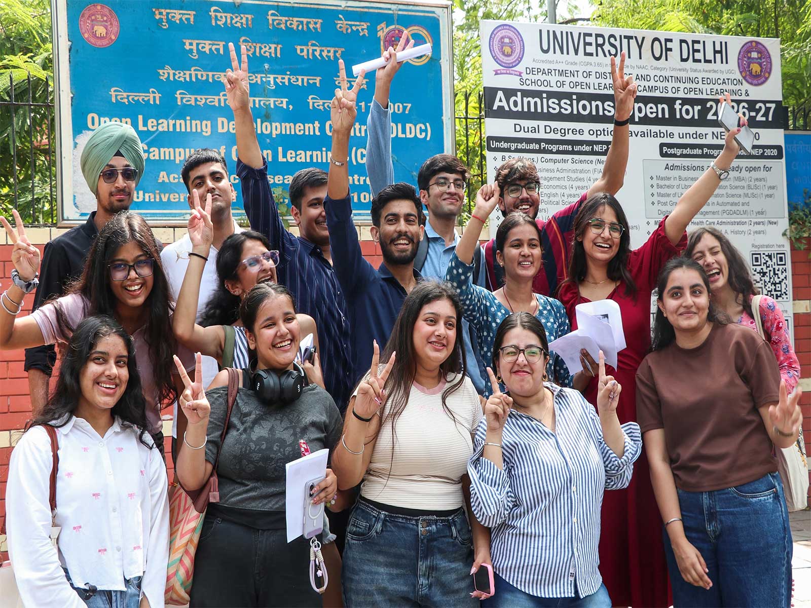 Students show victory signs at North Campus in New Delhi on Friday (Photo/ANI) Students show victory signs at North Campus in New Delhi on Friday (Photo/ANI)