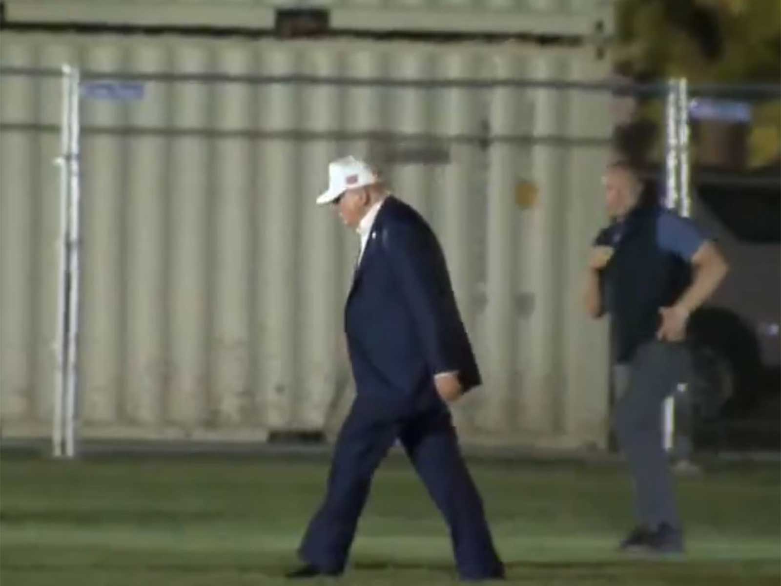 US President Donald Trump at the White House after cutting short his Camp David visit (Photo/US Pool via Reuters)