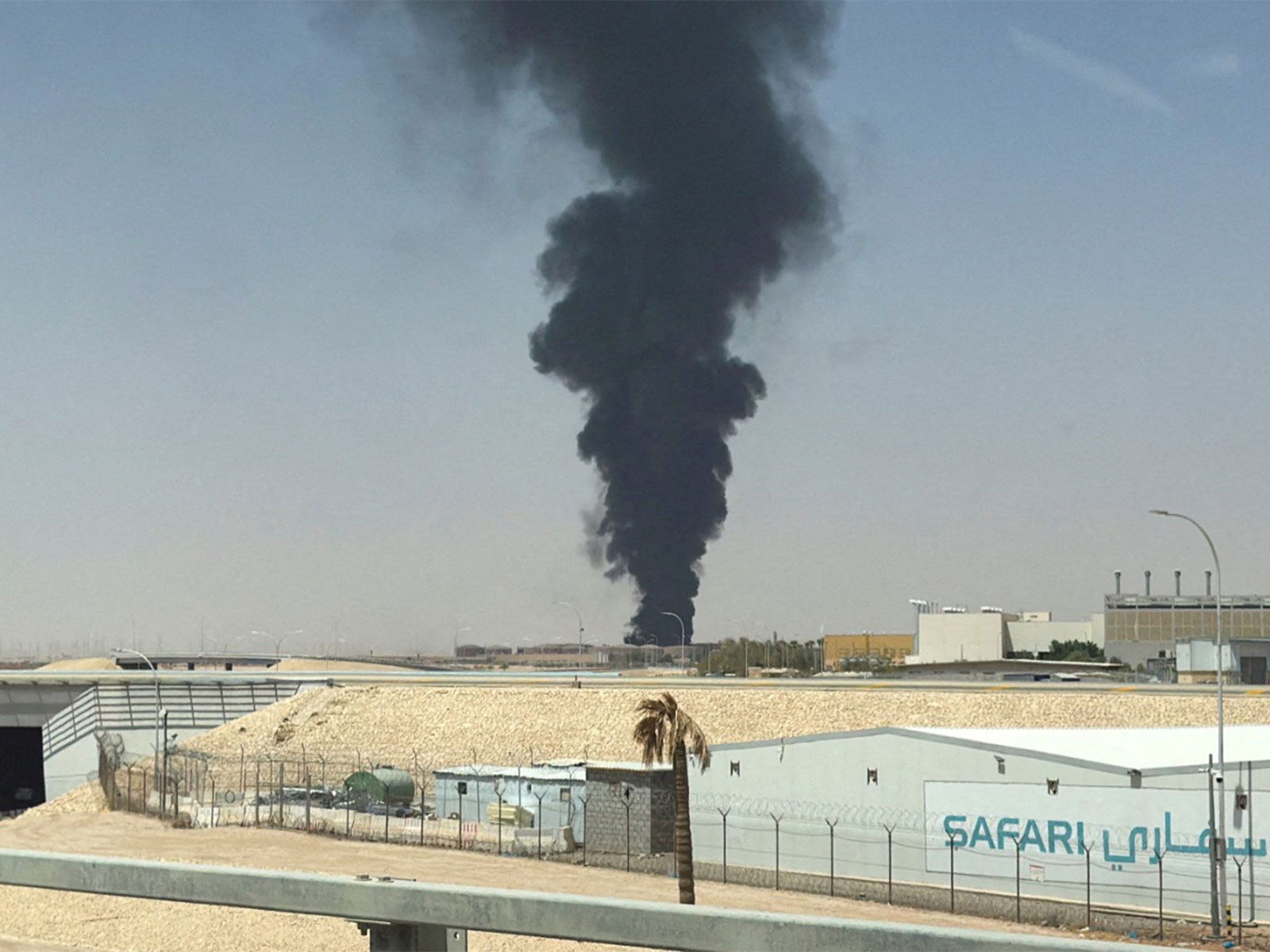 Large plume of black smoke rises from the fuel storage area at King Khalid International Airport, in Riyadh (Photo/Reuters) Large plume of black smoke rises from the fuel storage area at King Khalid International Airport, in Riyadh (Photo/Reuters)