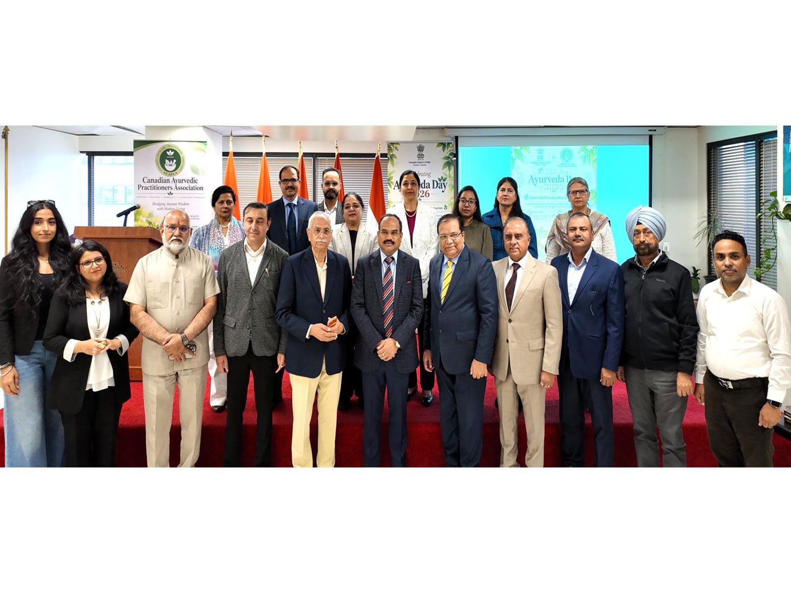 Consul General of India in Toronto, Mahavir Singhvi, along with attendees and speakers, poses for a group photograph during the celebration of Ayurveda Day 2026. (Image Source: Consulate General of India, Toronto)
