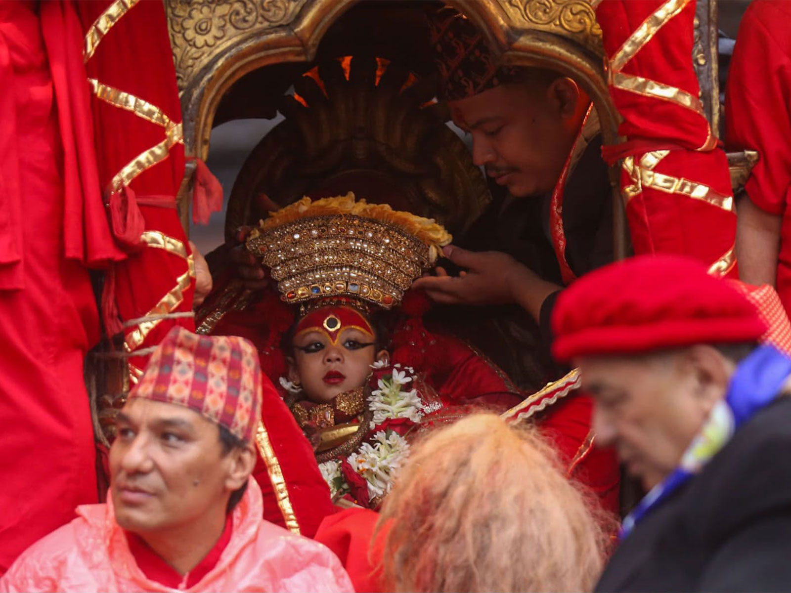 The newly anointed living goddess Kumari, Aryatara Shakya, participates in a five-day tour around Kathmandu on a chariot during the Indra Jatra festival (Photo/ANI)