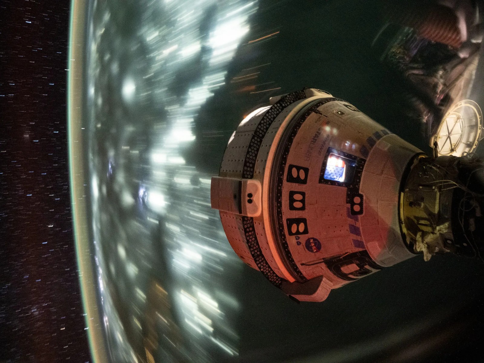 Boeingโs Starliner spacecraft docked to the International Space Station's Harmony module, captured from orbit on July 3, 2024. (Image Source: NASA) Boeingโs Starliner spacecraft docked to the International Space Station's Harmony module, captured from orbit on July 3, 2024. (Image Source: NASA)