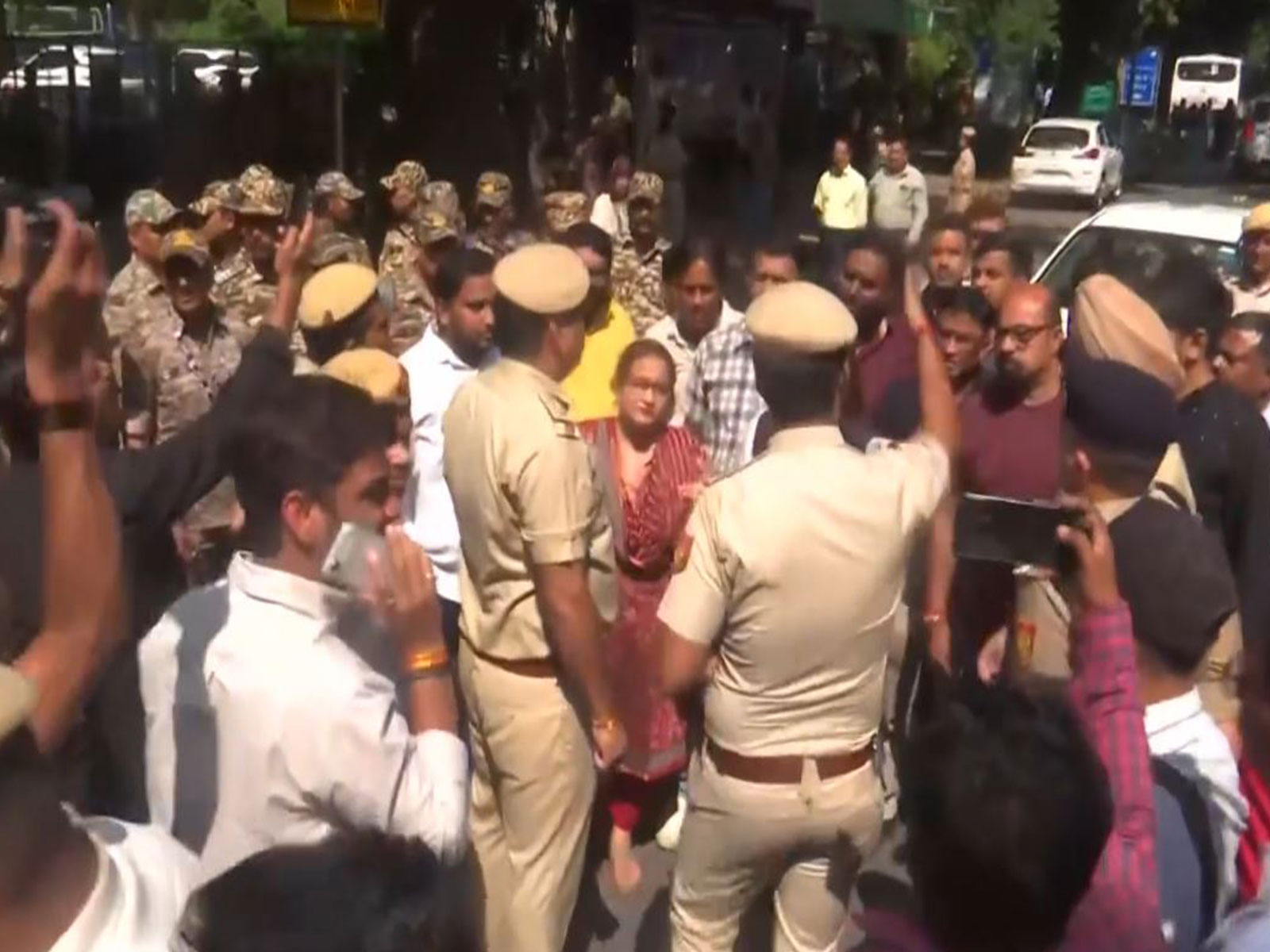 AAP workers detained by the police (Photo/ ANI) AAP workers detained by the police (Photo/ ANI)