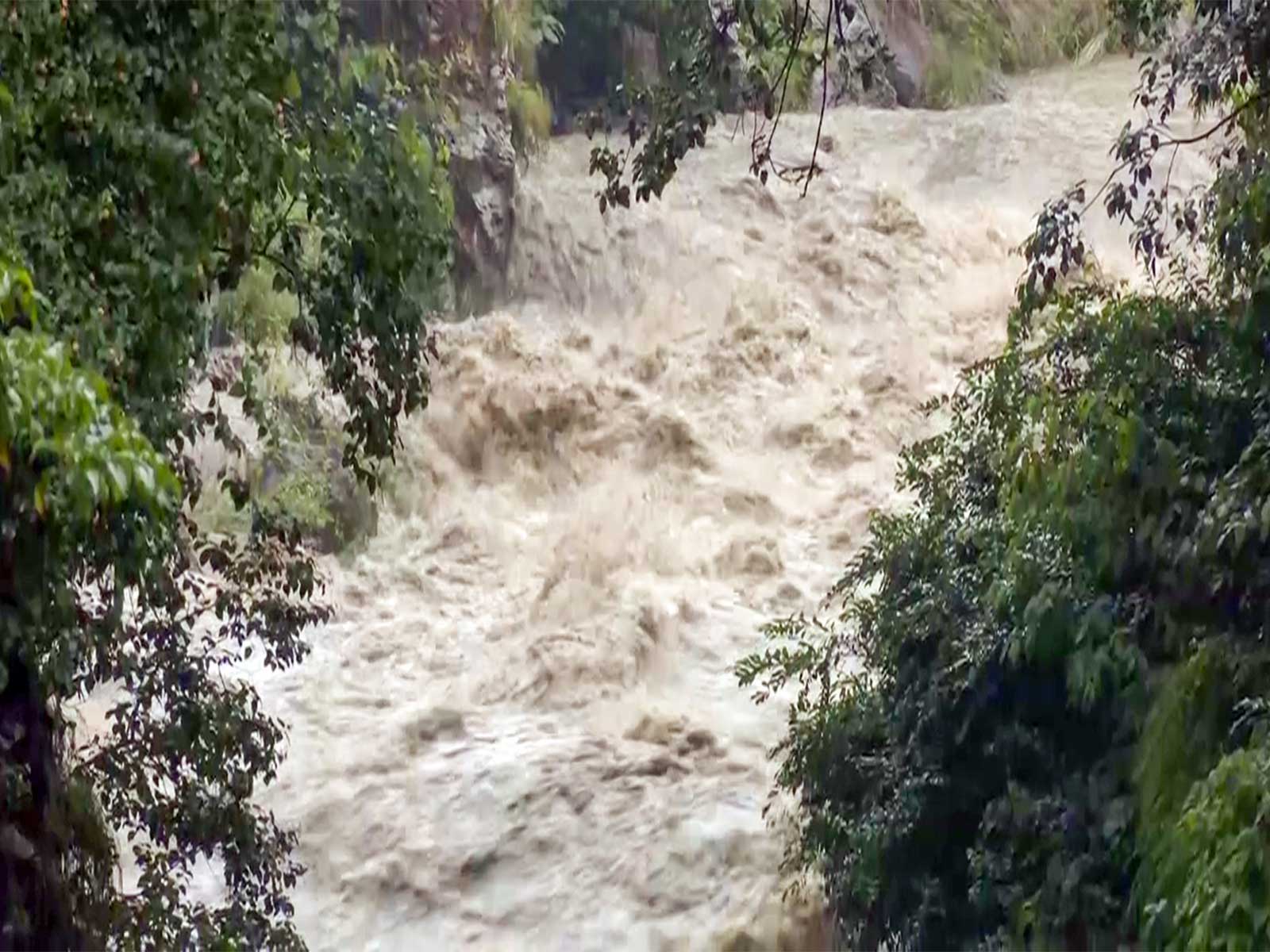 Raging river overflows furiously amid flash flood alerts in Kathmandu (File Photo/ANI) Raging river overflows furiously amid flash flood alerts in Kathmandu (File Photo/ANI)