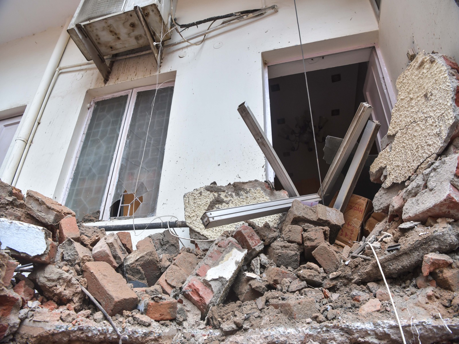 A view of the debris accumulated outside a house after a building collapsed near Satya Niketan at South-West Delhi (Photo/ANI) A view of the debris accumulated outside a house after a building collapsed near Satya Niketan at South-West Delhi (Photo/ANI)