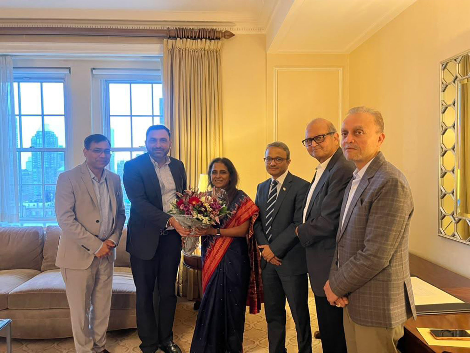 Sripriya Ranganathan, Secretary (CPV & OIA), Ministry of External Affairs, is greeted with a bouquet by Indian diaspora leaders during her interaction in New York, alongside Ambassador Binaya Srikanta Pradhan, Consul General of India in New York. (Image Source: Press Release) Sripriya Ranganathan, Secretary (CPV & OIA), Ministry of External Affairs, is greeted with a bouquet by Indian diaspora leaders during her interaction in New York, alongside Ambassador Binaya Srikanta Pradhan, Consul General of India in New York. (Image Source: Press Release)