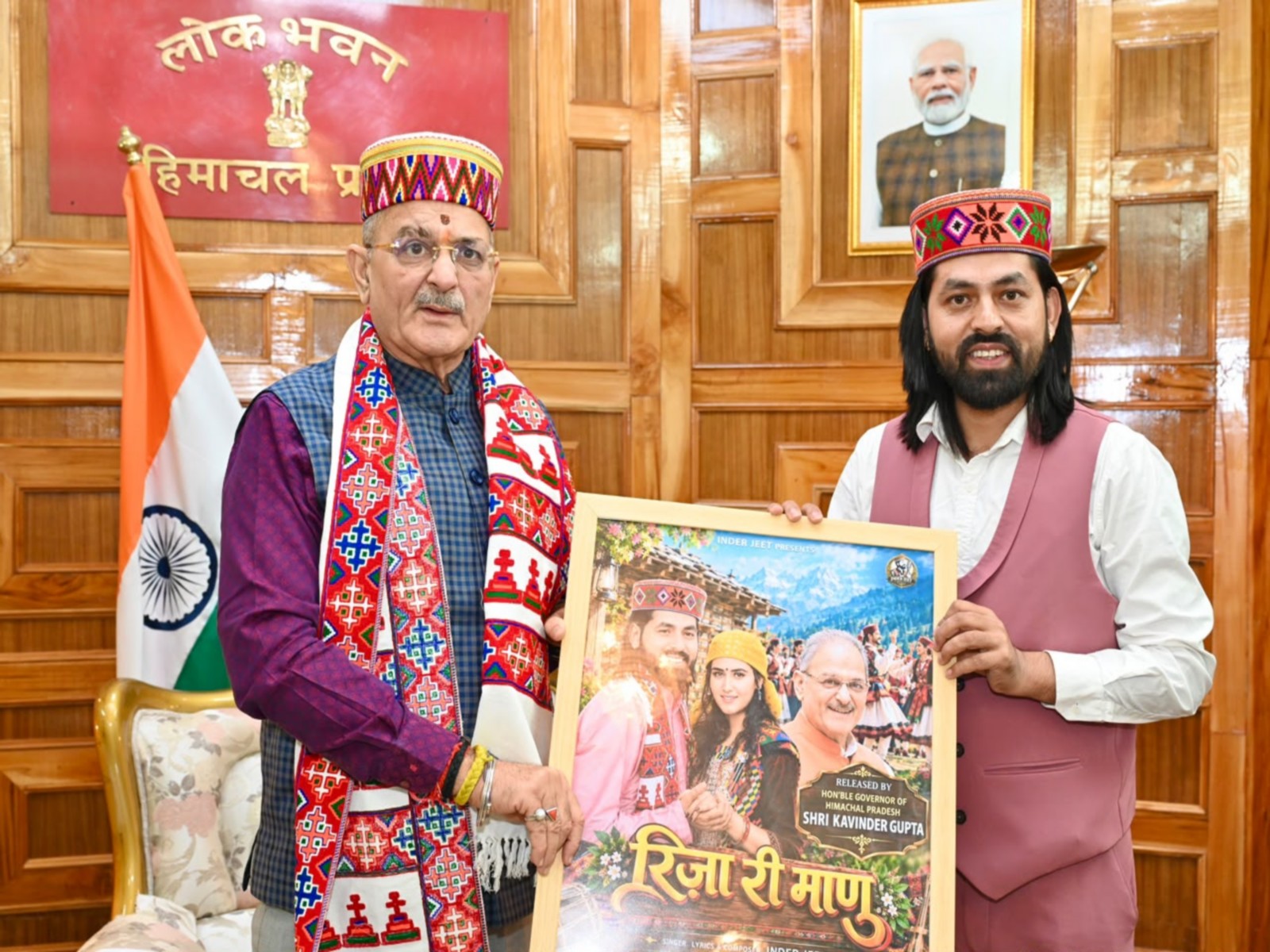 Himachal Pradesh Governor Kavinder Gupta launches Himachali folk singer Inder Jeet’s new song (Photo/ANI) Himachal Pradesh Governor Kavinder Gupta launches Himachali folk singer Inder Jeet’s new song (Photo/ANI)