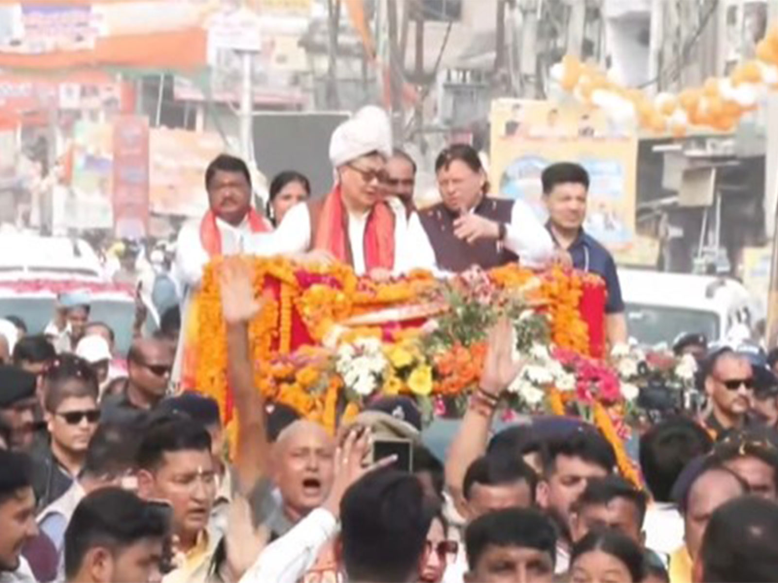 Uttarakhand CM Pushkar Singh Dhami with Union Minister Kiren Rijiju and Jual Oram (Photo/ANI)