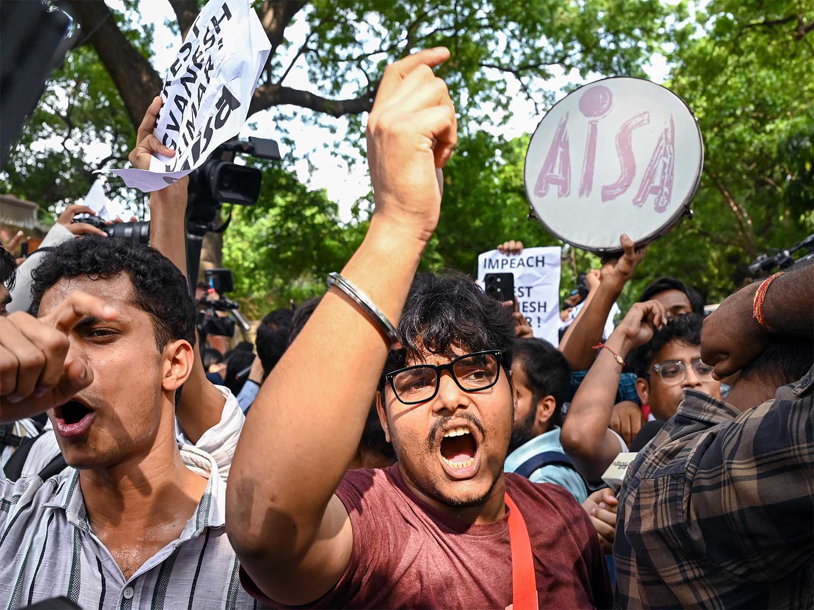 Members of the All India Students' Association (AISA) near Ashok Road  (Photo/ANI)