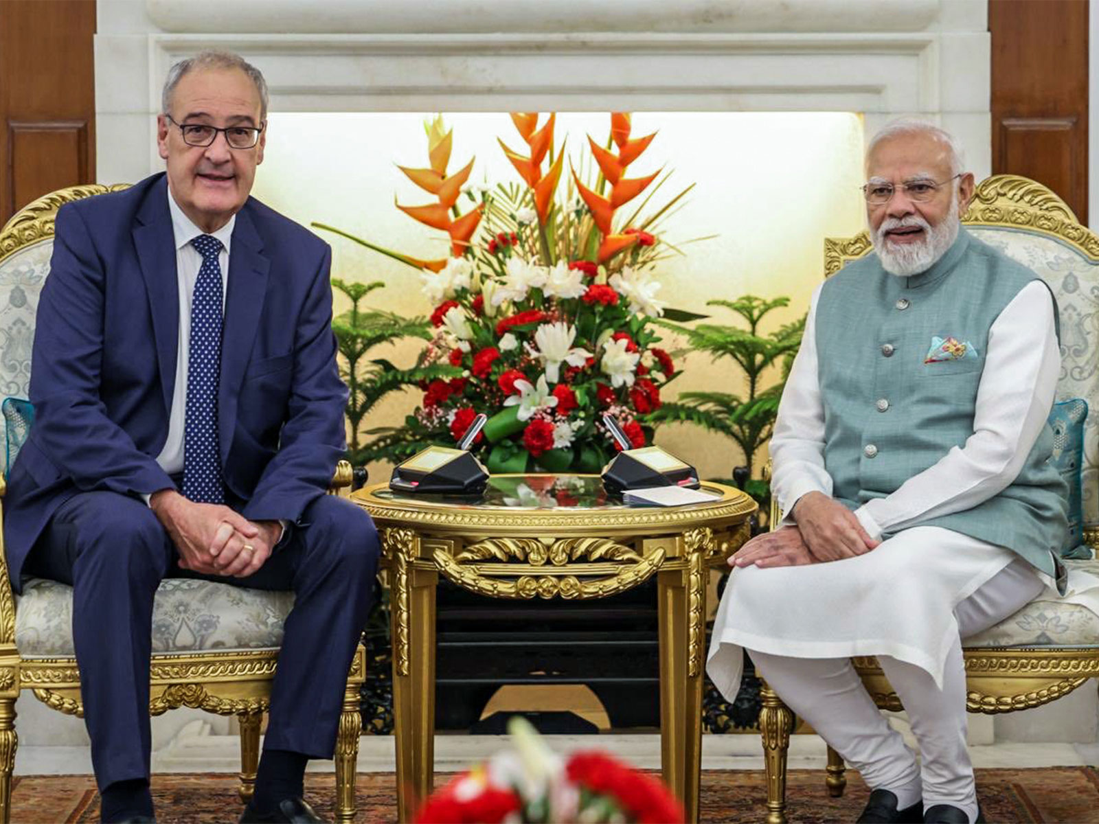 Prime Minister Narendra Modi and Swiss President Guy Parmelin (Photo/ANI) Prime Minister Narendra Modi and Swiss President Guy Parmelin (Photo/ANI)