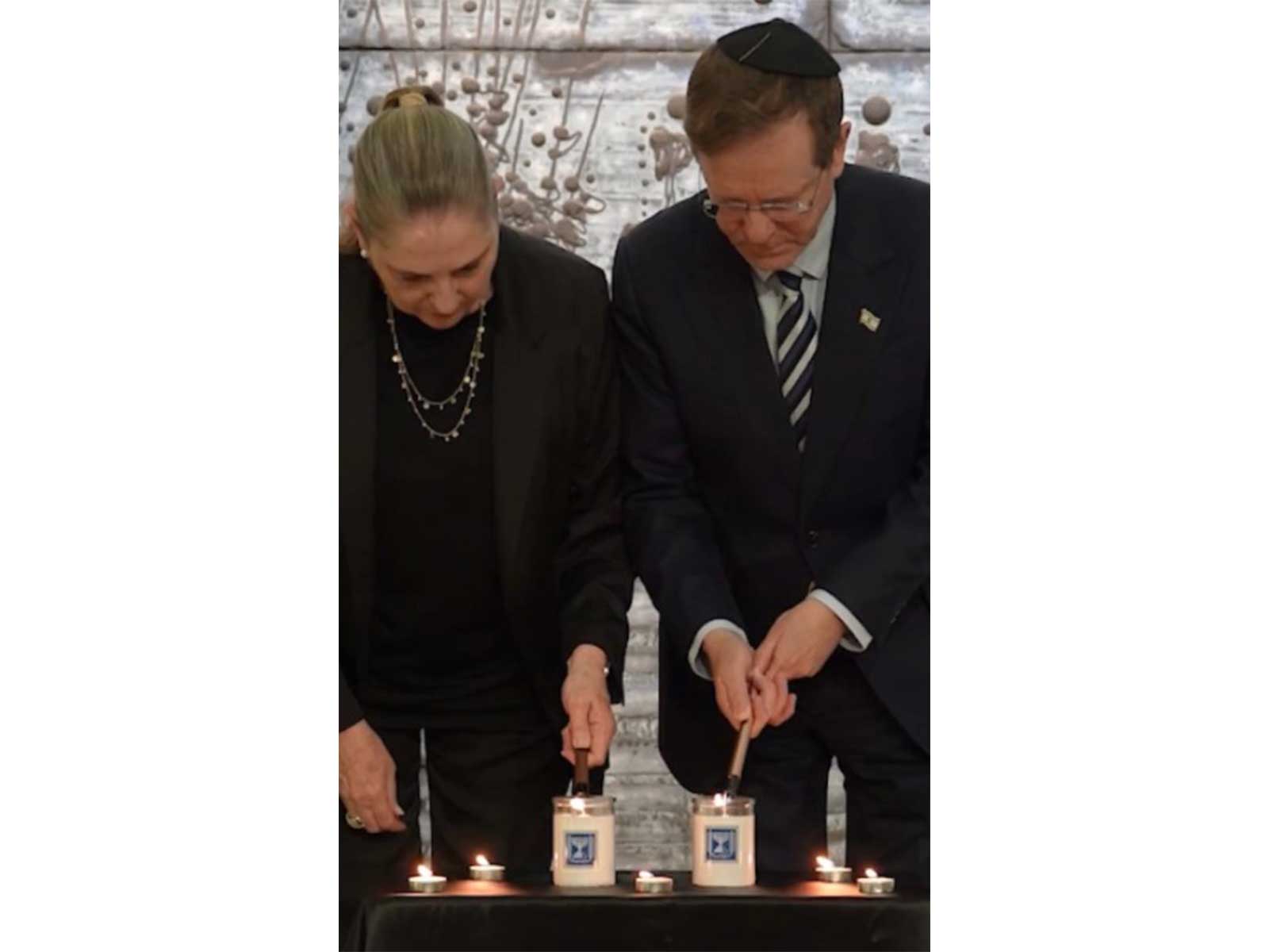 Israeli President Isaac Herzog lights memorial candle at President's Residence on October 7 attacks anniversary (Photo/X/@Isaac_Herzog) Israeli President Isaac Herzog lights memorial candle at President's Residence on October 7 attacks anniversary (Photo/X/@Isaac_Herzog)
