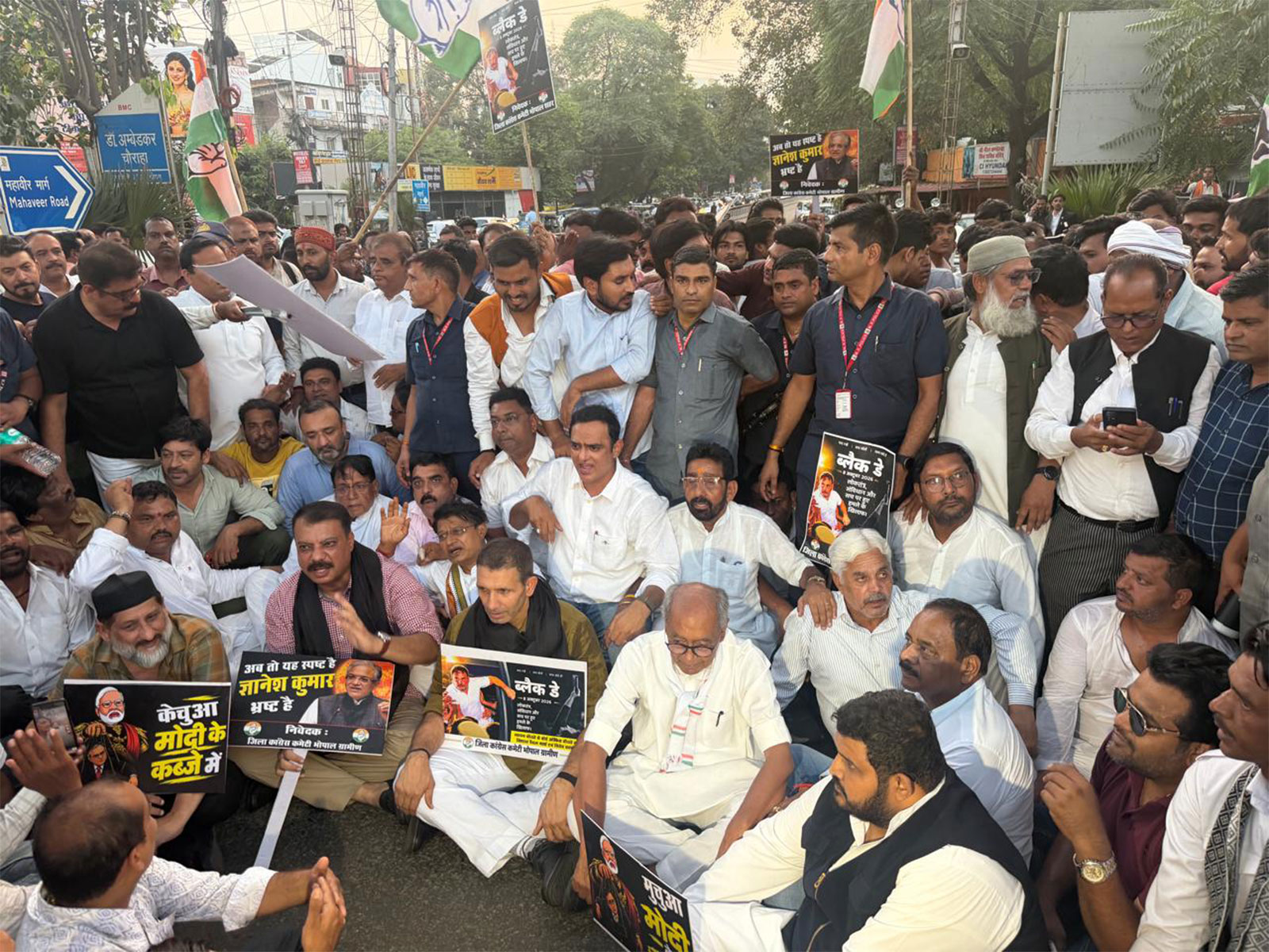 Congress leaders staging protest at Board office square in Bhopal (Photo/ANI)