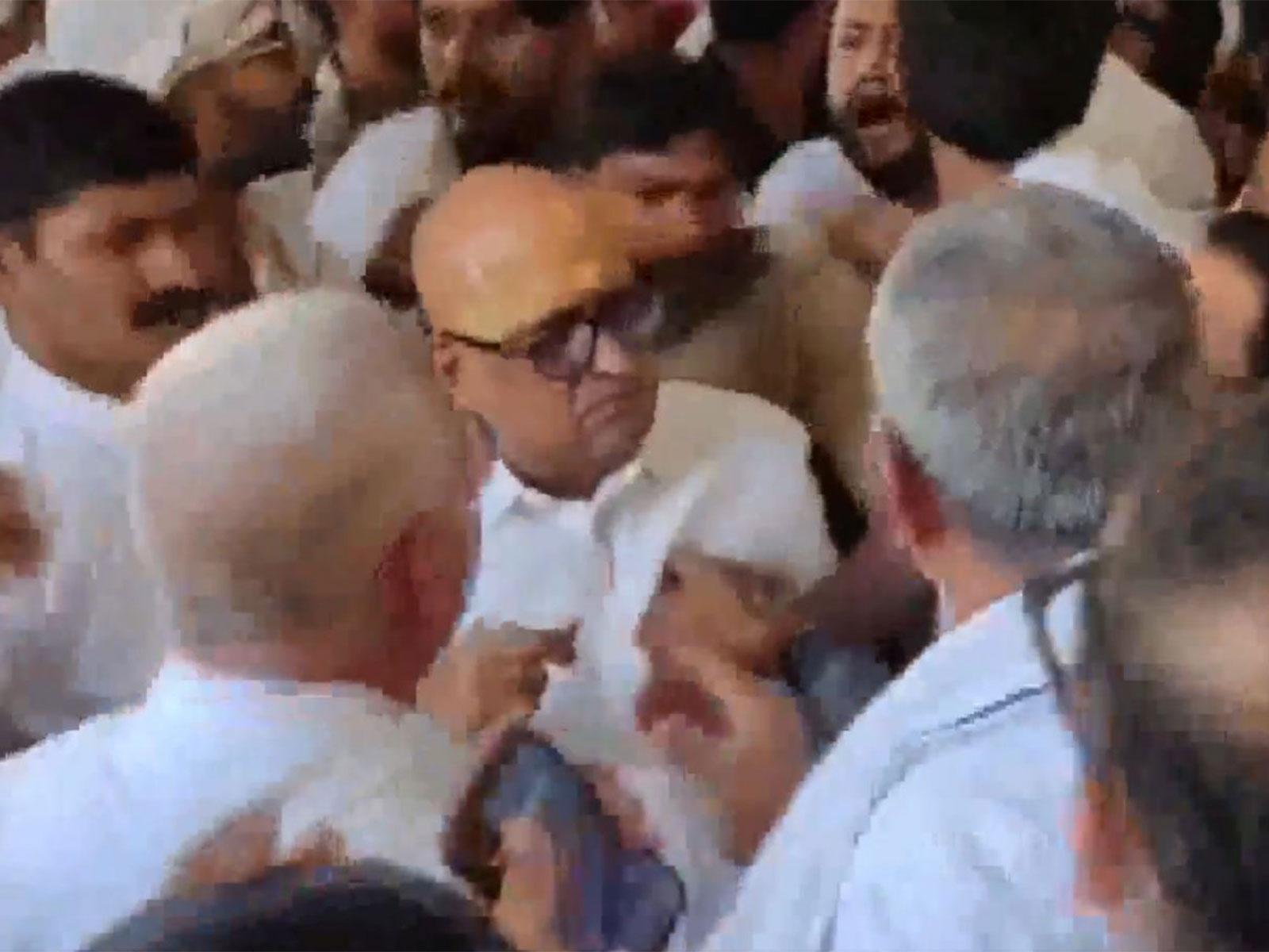 Scuffle among Congress workers in Lucknow (Photo/ ANI) Scuffle among Congress workers in Lucknow (Photo/ ANI)
