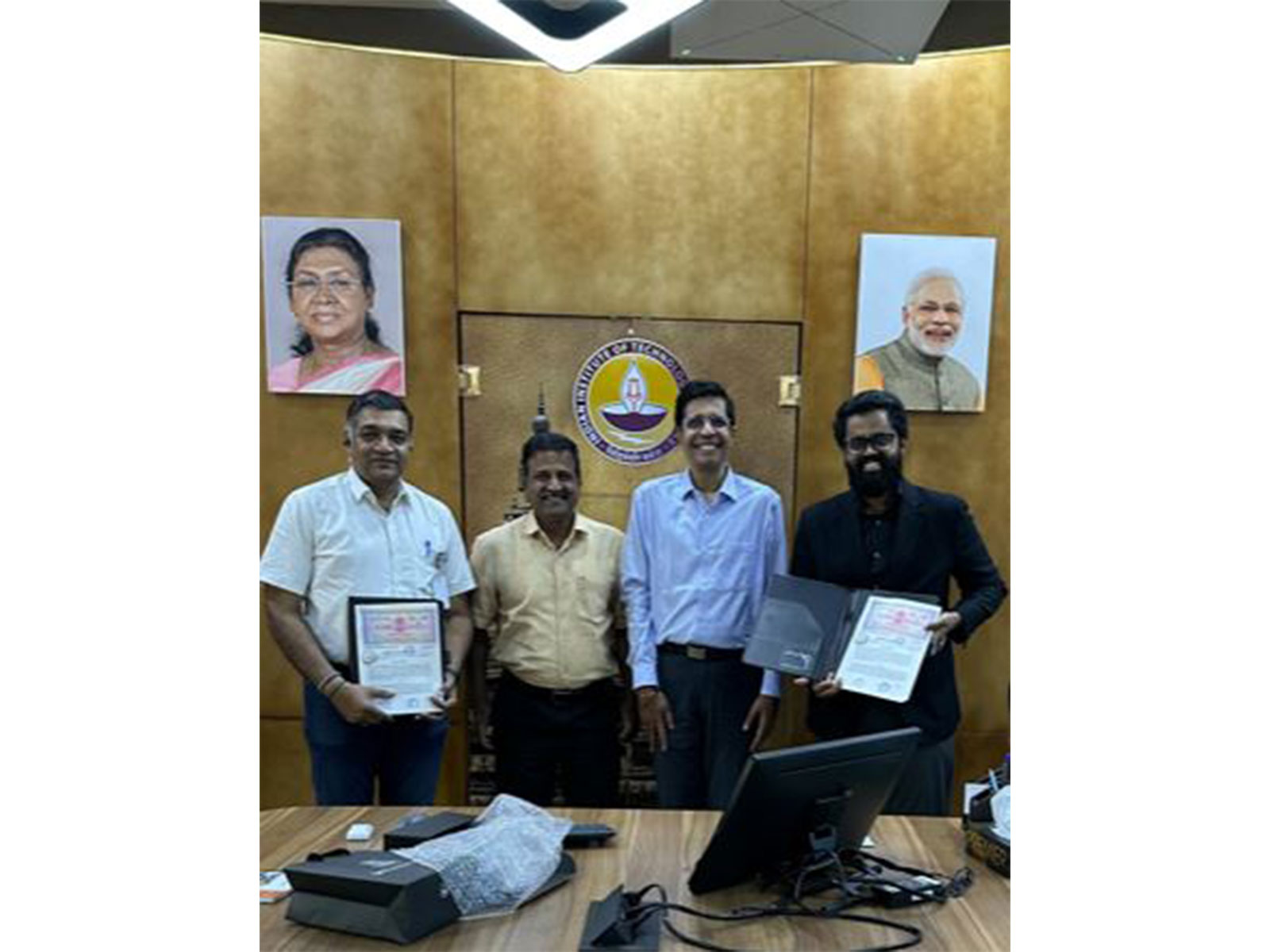 Exchange of the signed MoU at IIT Madras. (L to R) Dr. M. J. Shankar Raman, CEO, IITM Pravartak; Air Vice Marshal R. Guruhari (Retd.), Chief Advisor – Defence, Medhastra; Prof. V. Kamakoti, Director, IIT Madras; and Abinav Varma Kalidindi, Founder & CEO, Medhastra Techsystems. (Photo/ PIB)