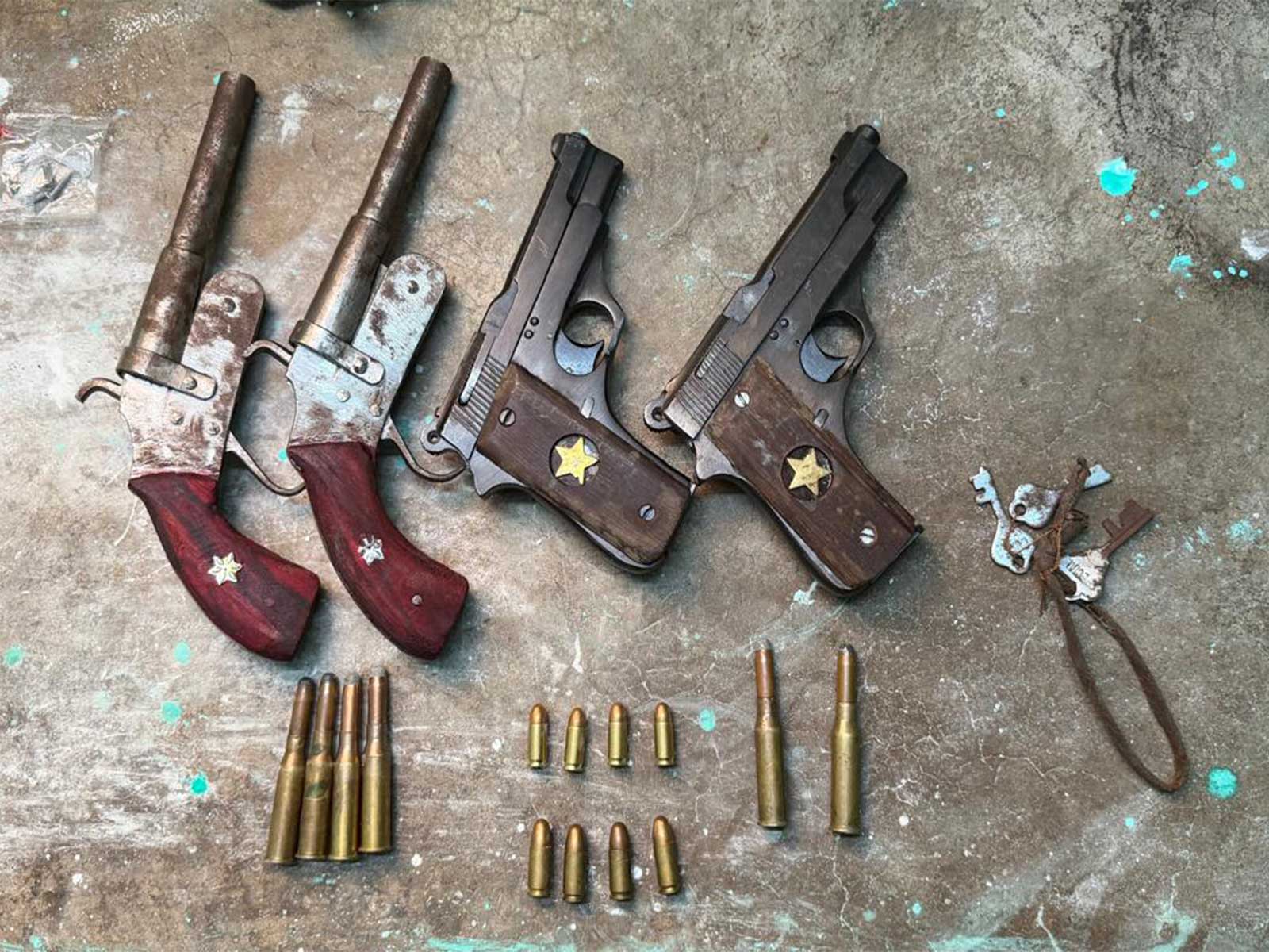 Firearms and ammunitions' recovered during raid (Photo/ANI)