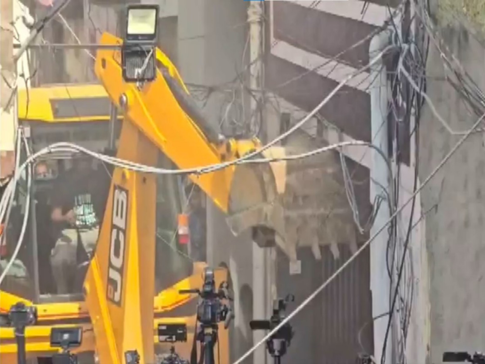 Demolition being carried out at Jhota's murder accused's house (Photo/ANI)
