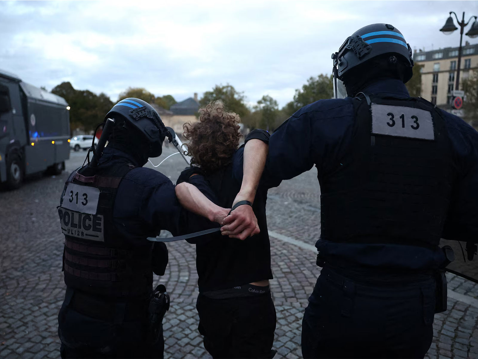 French police apprehend a protester amid clashes during a demonstration by French high school and university students in Paris (File Photo/Reuters) French police apprehend a protester amid clashes during a demonstration by French high school and university students in Paris (File Photo/Reuters)