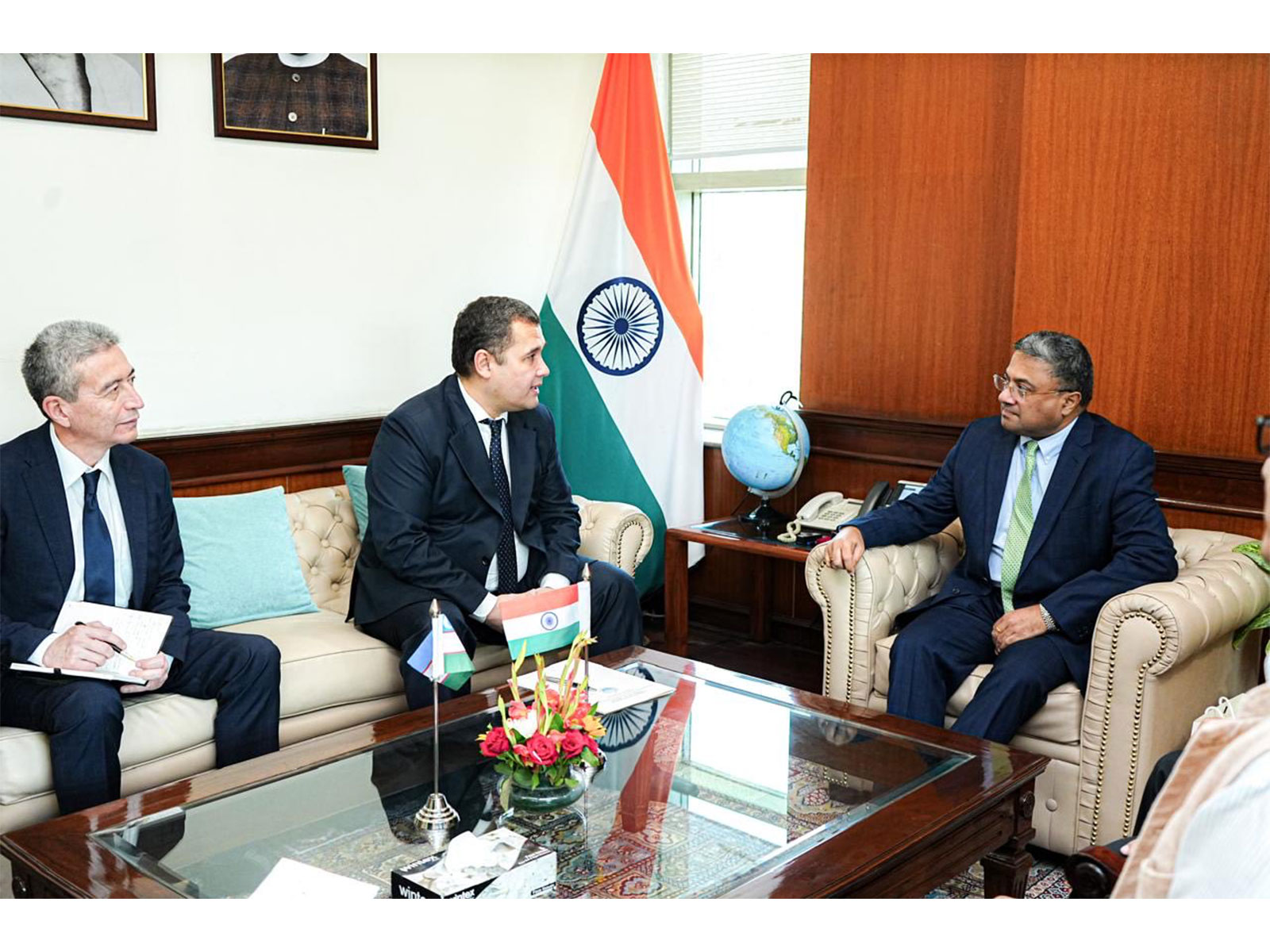 Uzbek Foreign Ministry official Pirimkulov Gulomjon Shodmonkulovich (Centre) and MEA Secretary (West) Sibi George (Right) (Photo/X/@MEAIndia)