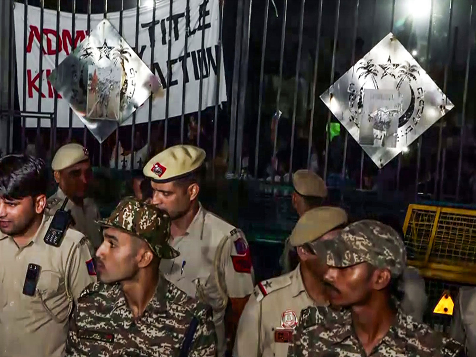 Security personnel stand guard as Jamia Millia Islamia students continue their protest over various demands (File Photo/ANI) Security personnel stand guard as Jamia Millia Islamia students continue their protest over various demands (File Photo/ANI)